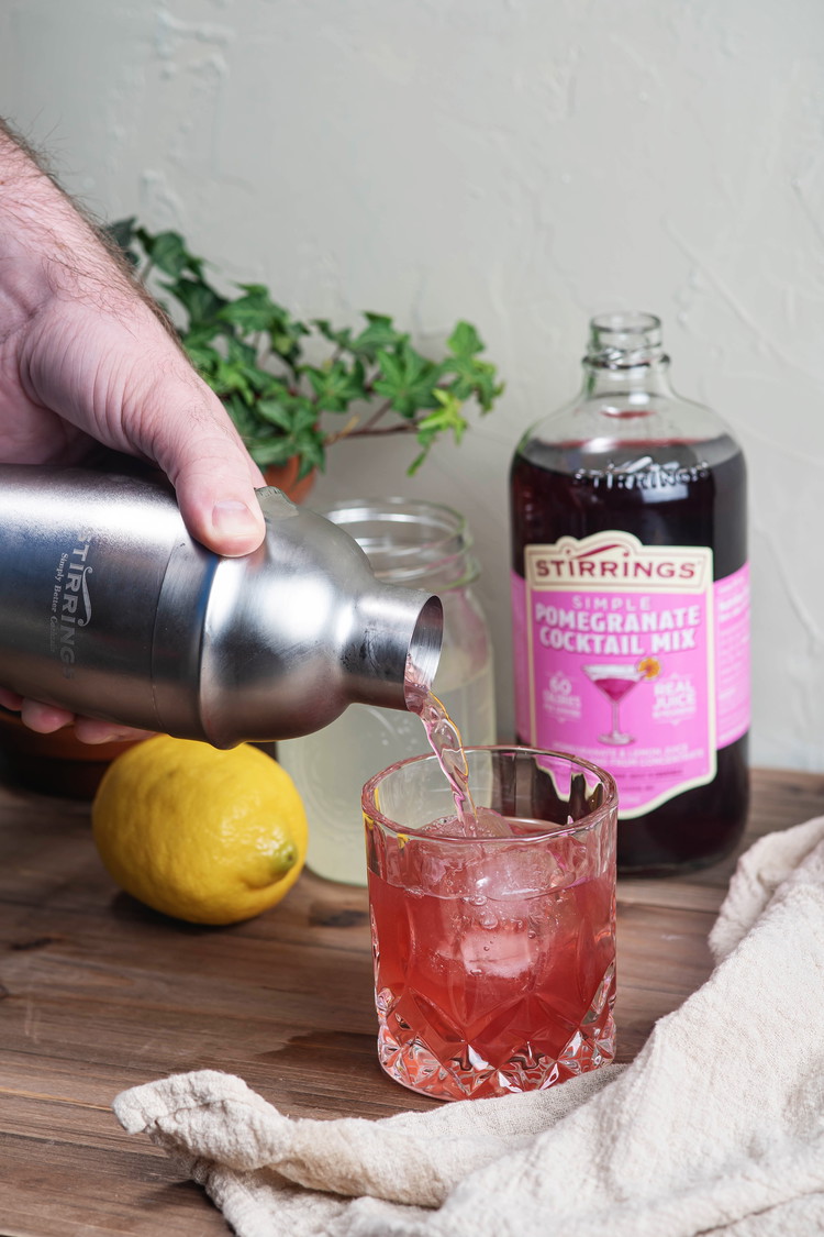 Image of Shake well. Strain over fresh ice into a double old-fashioned glass.