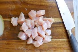 Image of Chop 1 pound of either boneless skinless chicken thighs or...