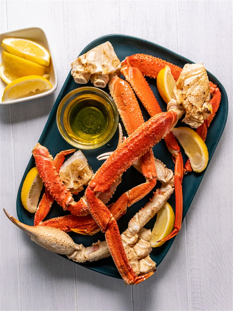 Image of Brush butter mixture on crab legs. Broil for 4 minutes....