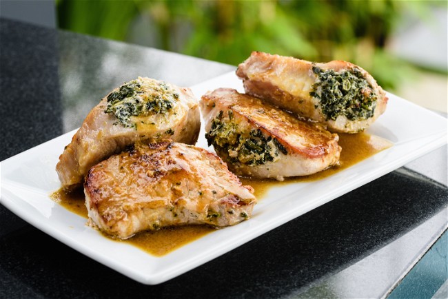 Image of Pork Chops Stuffed with Sun-Dried Tomatoes and Spinach