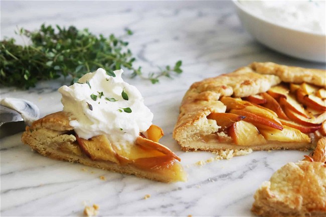 Image of Grilled Peach Crostata with Thyme Whipped Cream