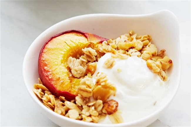 Image of Rosemary Peaches with Vanilla Bean Yogurt and Granola