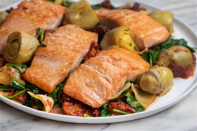 Image of One-Pan Salmon with Artichokes and Sundried Tomatoes