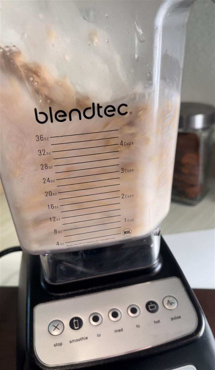 Image of Add cashews and 1 cup of fresh filtered water to...