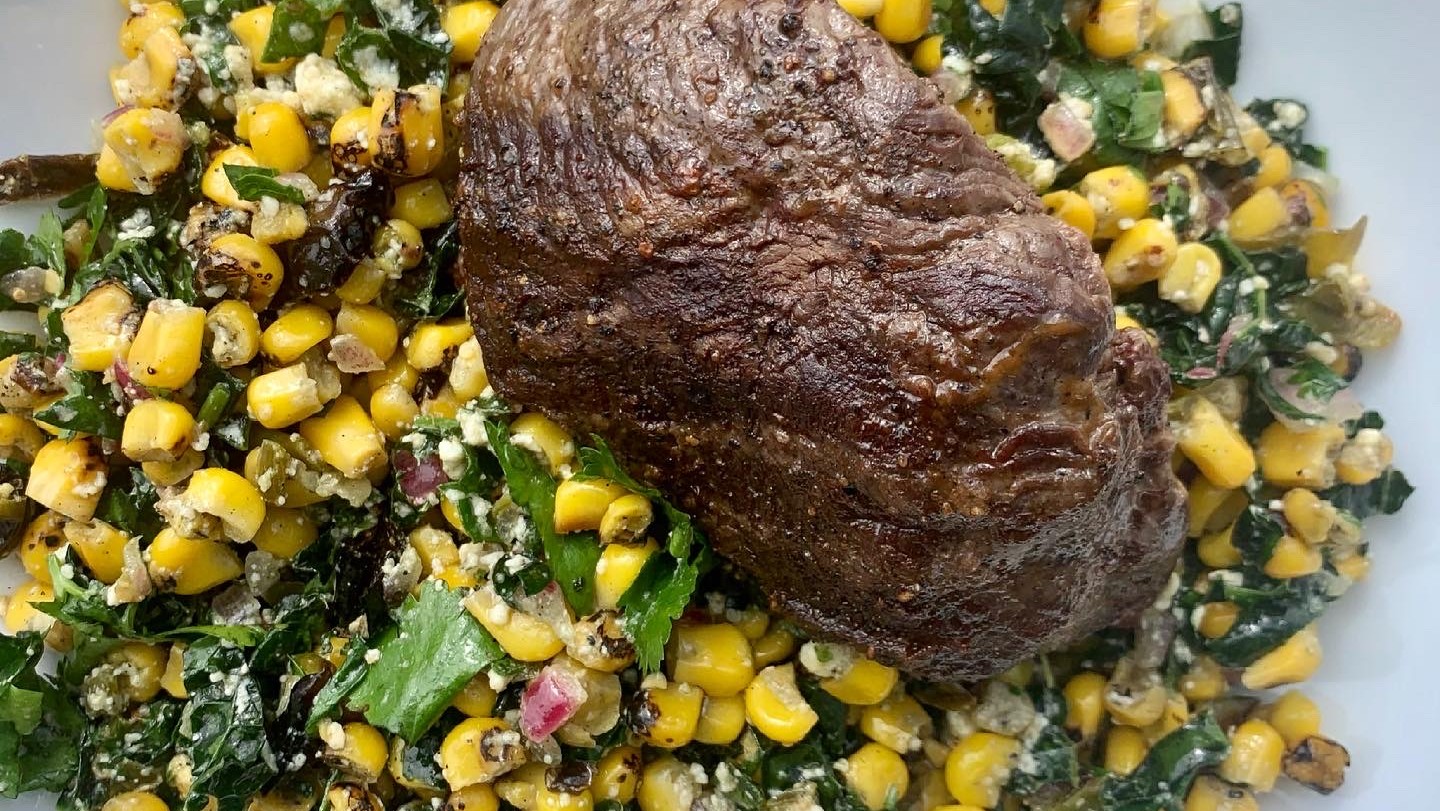 Image of Grilled Steak Over Shishito Pepper and Corn Bowl