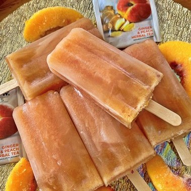 https://images.getrecipekit.com/20220614140236-giner_peach_popsicles_detail.jpeg?aspect_ratio=1:1&quality=90&