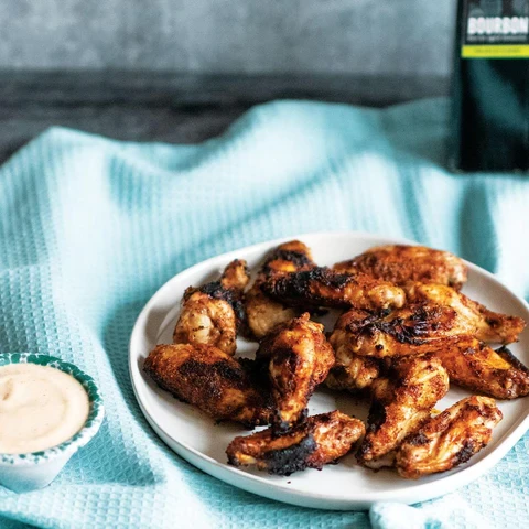 Image of GRILLED CHICKEN WINGS WITH ALABAMA WHITE SAUCE