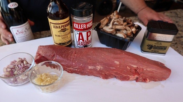 Image of Trim the whole beef tenderloin into center cut portion be...