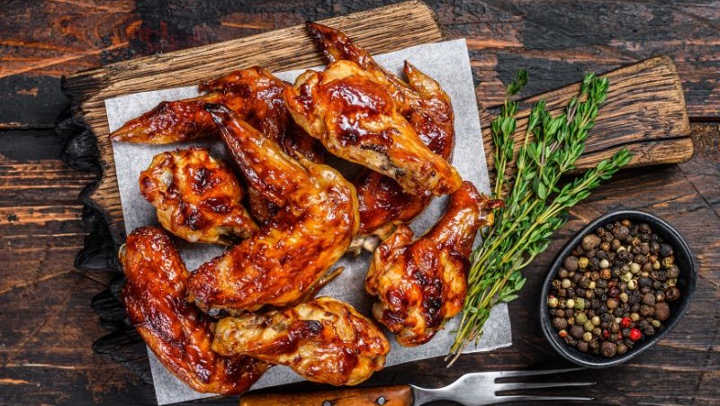 Image of Smoky Chicken Wings W/ Honey, Bourbon, & Molasses Sauce