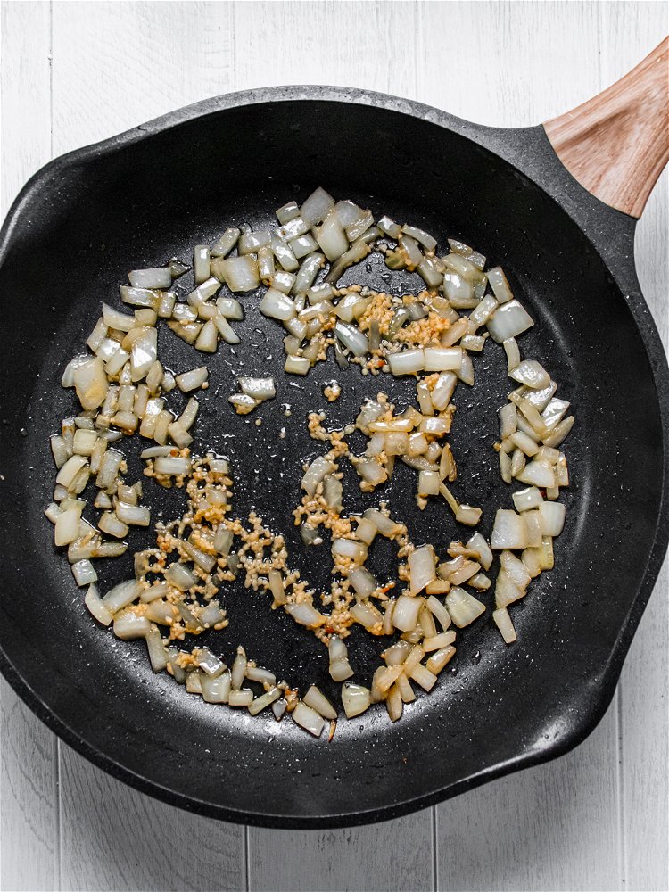 Image of Add onions to skillet and sauté for 5 minutes, until...