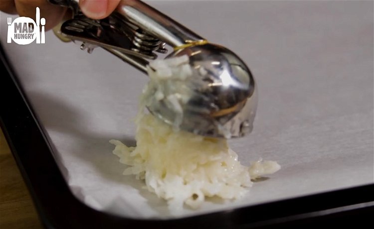 Image of Using an ice cream scoop, scoop and press the scoop...