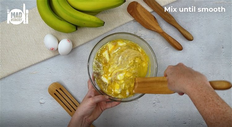 Image of In a medium bowl mix together melted butter, sugar, eggs,...