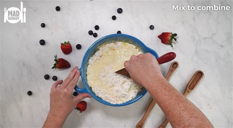Image of Pour wet ingredients into dry and mix with your Mad...