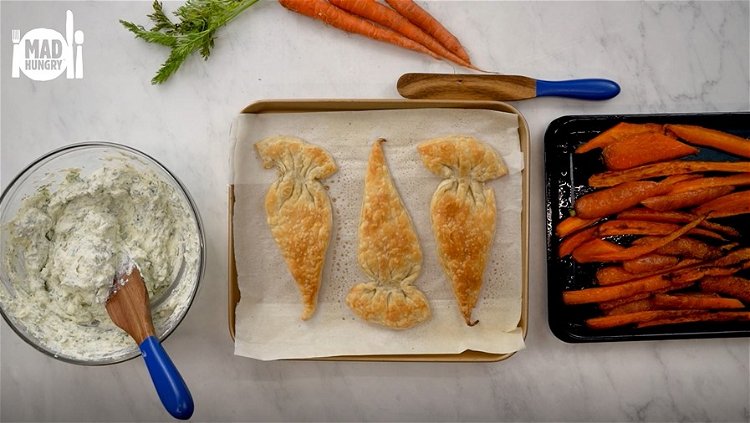 Image of Remove carrots and puff pastry from the oven and set...