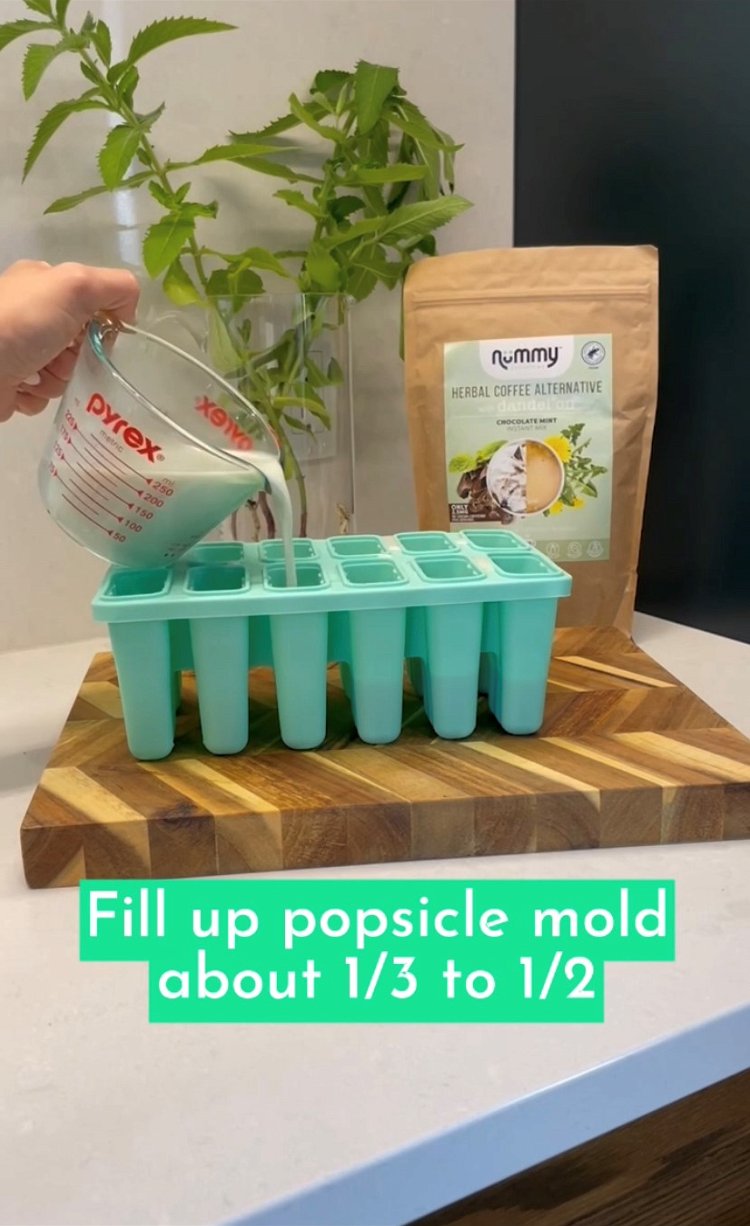 Image of Fill your popsicle mold about 1/3 to 1/2 full, depending...