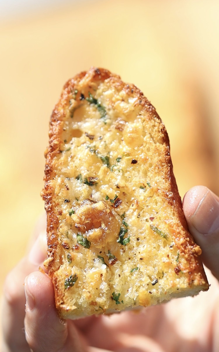 Image of This stunning piece of work is what garlic bread nirvana looks like!