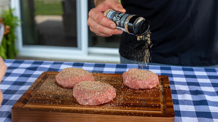 Image of Generously season patties with Bold & Beefy Seasoning and place over direct heat on the grill.