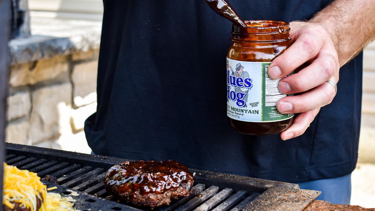 Image of Remove from direct heat and coat in Smokey Mountain Barbecue Sauce. Cover grill and let the sauce get tacky. 