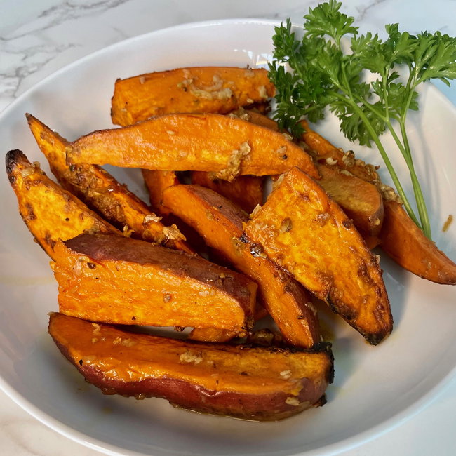 Image of crispy garlic sweet potato wedges