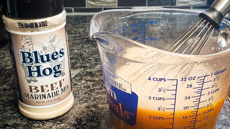 Image of Mix Blues Hog Beef Marinade, water and fajita marinade until well blended. Set aside.