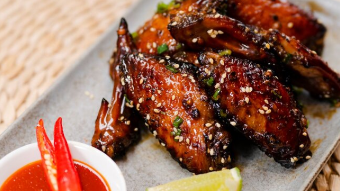 Image of Que's Grilled Sweet and Pepper Chicken Wings