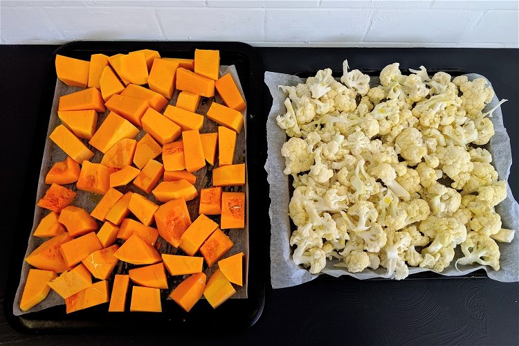 Image of Chop your cauliflower and pumpkin into even chunks, drizzle with...