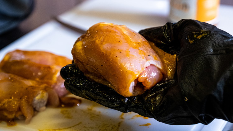 Image of After letting the chicken thighs marinate, pat off extra honey mustard and season generously with both Sweet & Savory Seasoning and Bold & Beefy Seasoning