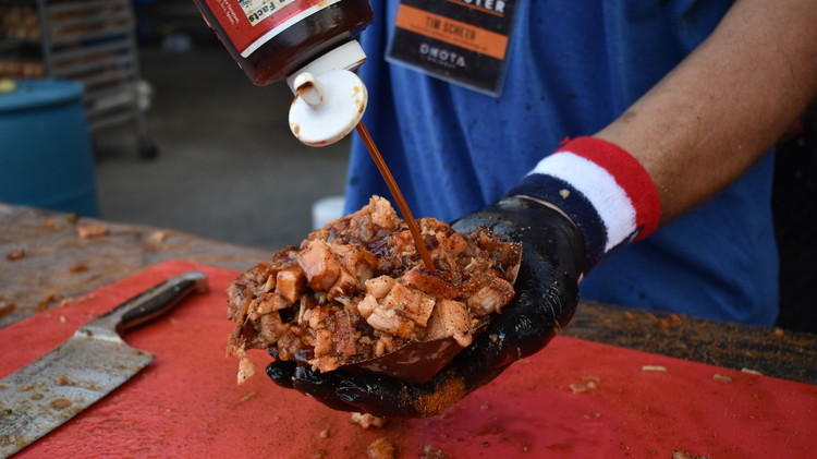 Image of Sauce up the pork belly in Tennessee Red to add more moisture and flavor.