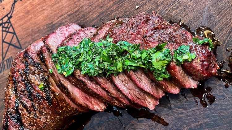 Image of Slice against the grain and serve with chimichurri sauce over...