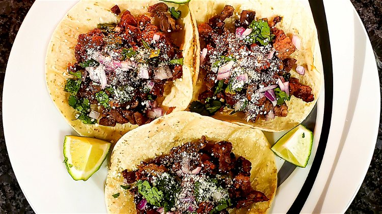 Image of Build your tacos how you like them with steak, onions,...