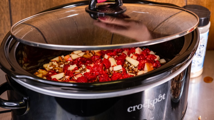 Image of Cover with lid and let cook on high for 3 hours or low for 5-6 hours. As the pork cooks, you'll want to occasionally baste the top of the pork with the juices at the bottom to keep it moist.