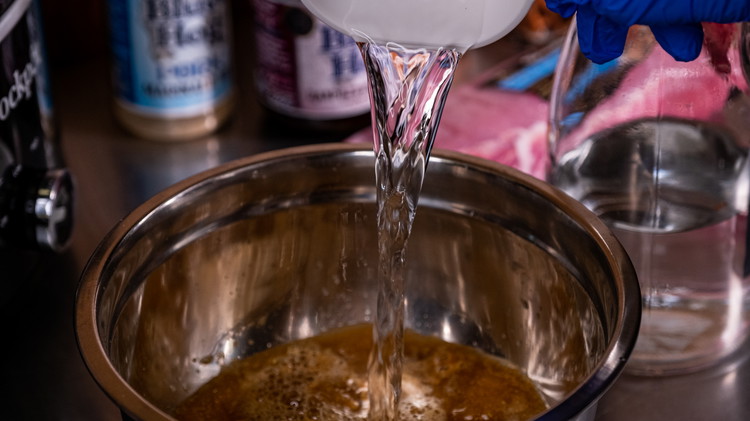 Image of Begin by whisking together the dry pork marinade and water. 