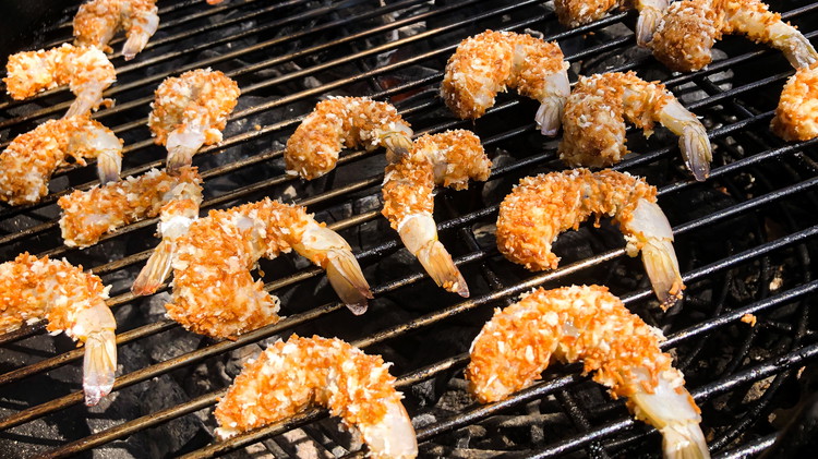 Image of Grilling: Grill shrimp medium heat, preferably not over direct heat, about 5-8 minutes, flipping partway.  Want the shrimp to turn from translucent to white and the tail should turn vibrant orange pink.
