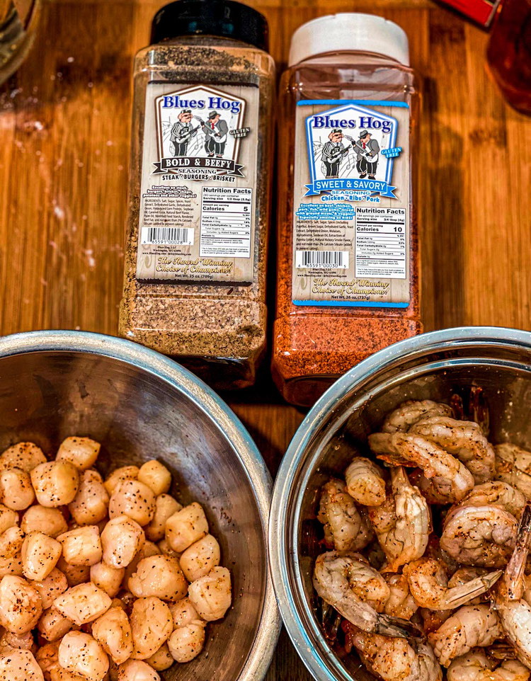 Image of Coat scallops and shrimp in a mix of Bold and Beefy and Sweet and Savory. Let sit for 15-20 min to marinate.