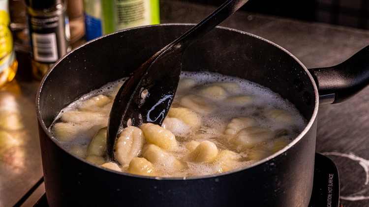 Image of When the soup is nearly done, prepare your gnocchi according to the directions on the package and add into the soup just before serving. Do not cook the gnocchi in the pot with the soup because the potato formation is...