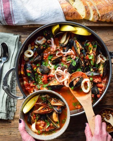 Image of Mussels & Squid In a Spicy Tomato-Sausage Broth