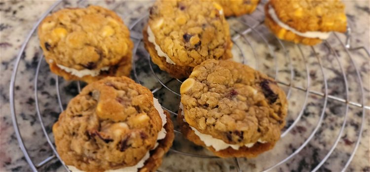 Image of Serve two cookies with a glass of chai for that...