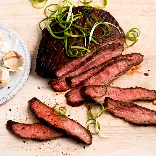 Image of Grilled Flank Steak With Fresh Garlic and Asian BBQ Rub