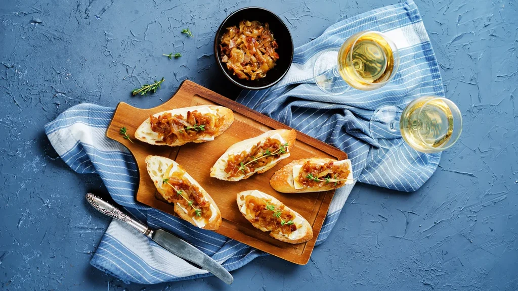 Image of Crostini with Brie and Bourbon Bacon Jam