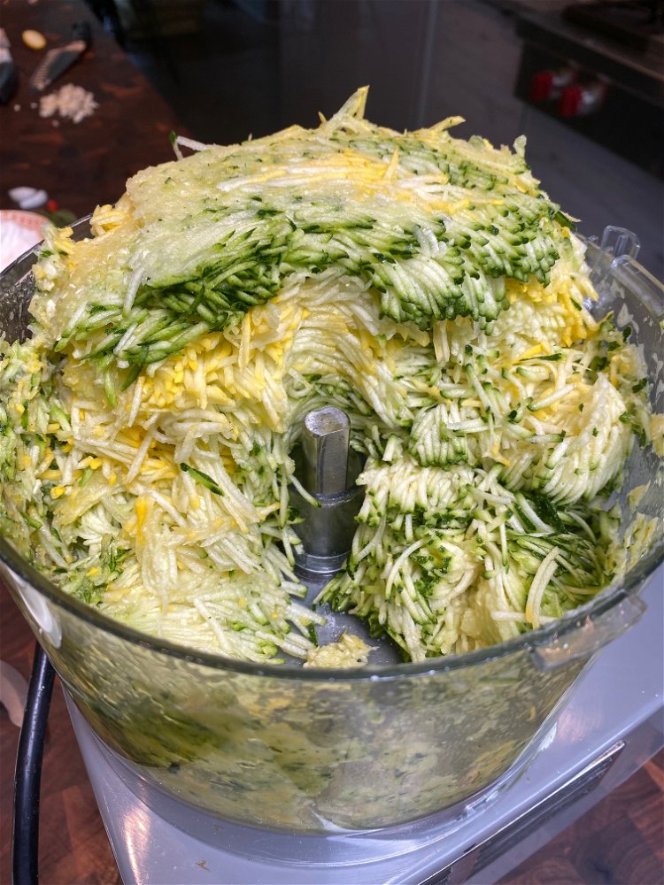 Image of In food processer shred zucchini and summer squash
