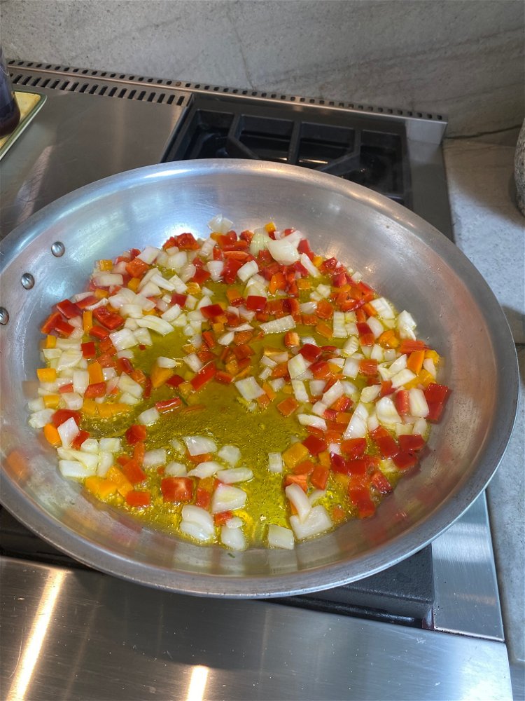 Image of Heat lemon olive oil in fry pan over medium heat....