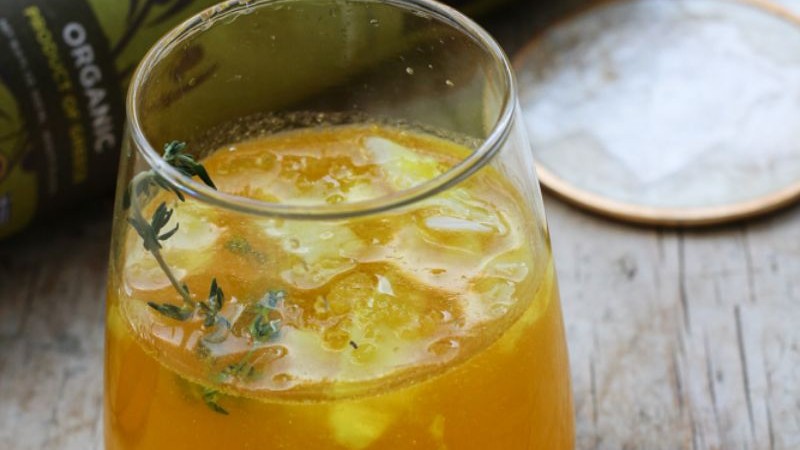 Image of Orange Thyme Whiskey Smash With Olive Oil Drops