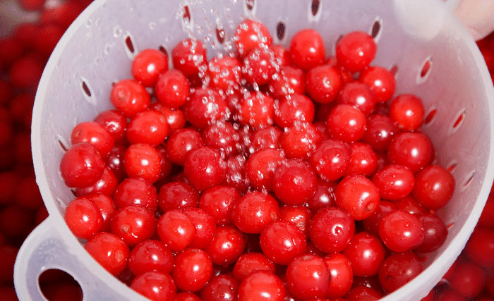 Image of First get your cherries ready for pitting. Put your cherries...