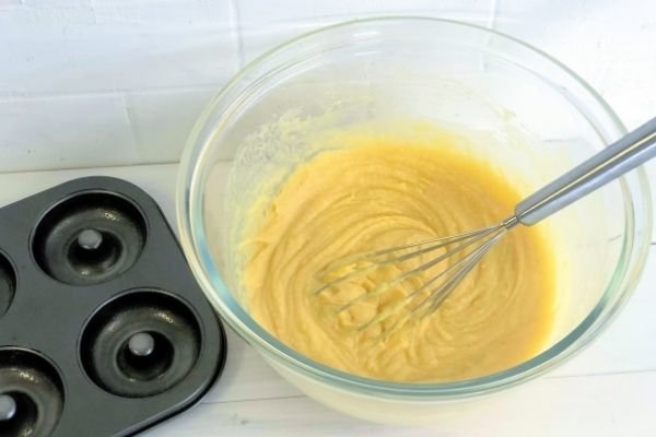 Image of In a large bowl whisk together eggs, milk and melted...