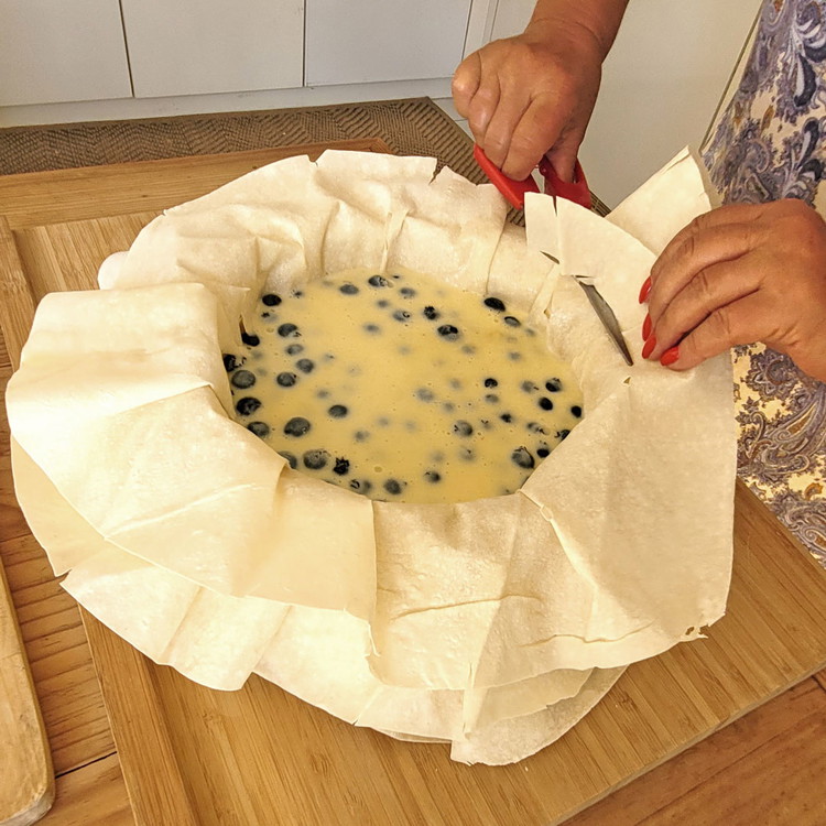 Image of Sobald der Vanillepudding eingedickt ist, giesst du ihn zu den Beeren