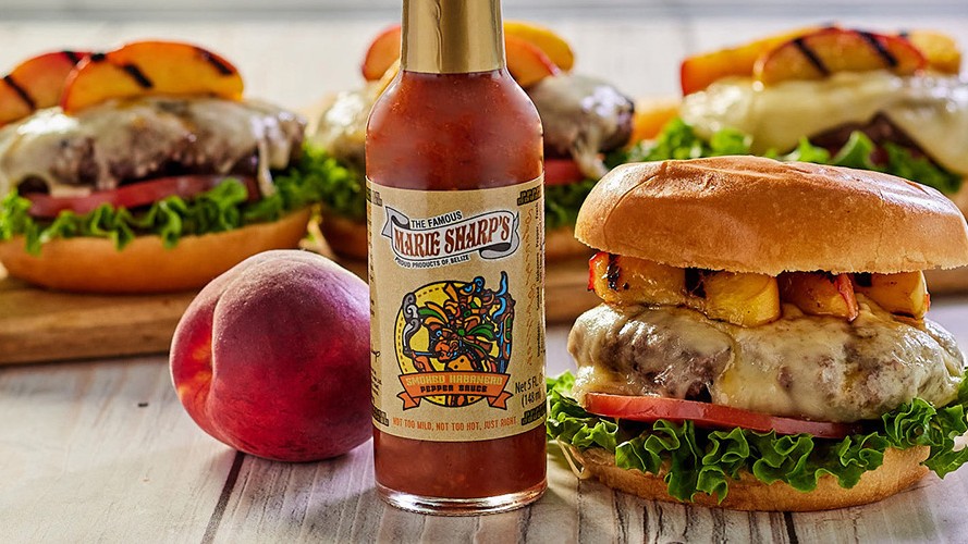 Image of Cheeseburger with Havarti and Grilled Peaches with Marie Sharp’s Smoked Habanero Pepper Sauce
