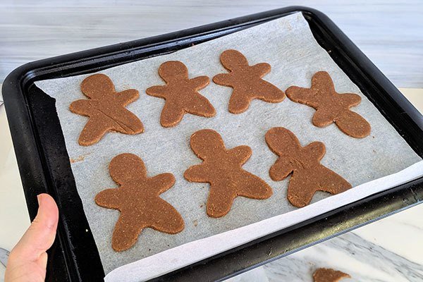 Image of Cut out your cookies and place onto the lined tray.