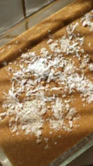 Image of Optional:If using, spread the coconut flakes and raw sugar over...