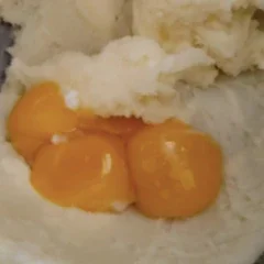 Image of Separate egg whites and yolks, add the yolks into the...