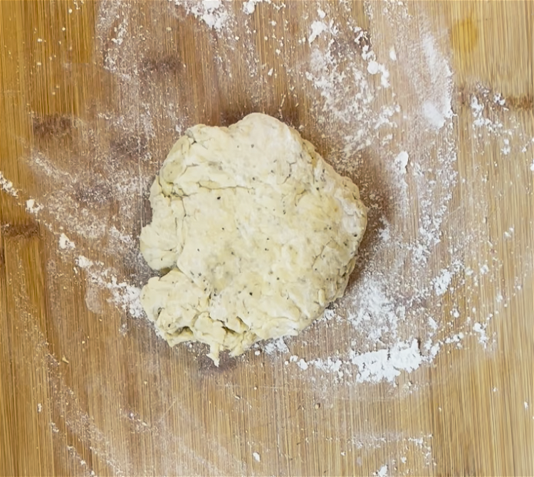 Image of Mix the wet and the dry together until a dough...